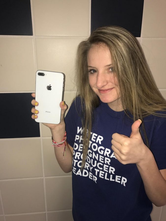 Kylie Fitzgerald pictured with her brand new iPhone 8+

Photo by: Cate Young