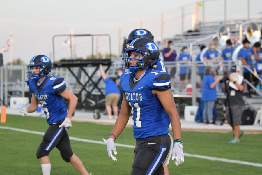 Senior wide receiver, David Juarez warms up to take on the Alvarado Indians Friday, September 4. 