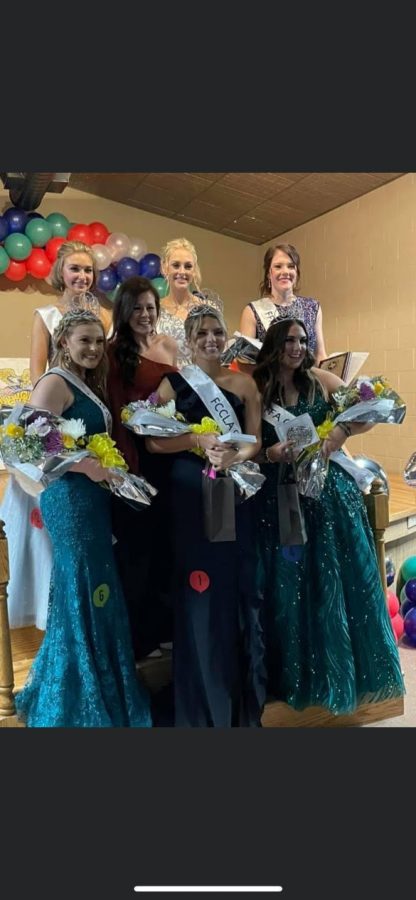 Each of the newly crowned Youth Fair Queens with their runners up pose with former Miss USA after the ceremony.