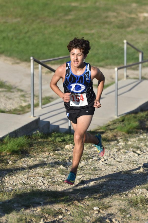 Running at Eagle Summit,  the Decatur Cross Country team debuted the teams new uniforms.