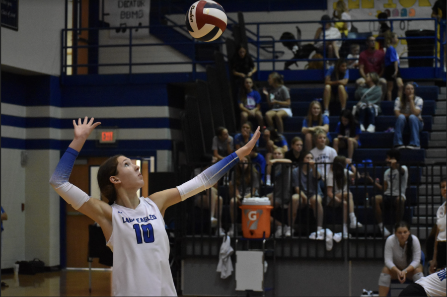 Junior Haylie Huggins serves for the Lady Eagles in a home match against Wichita Falls Rider.