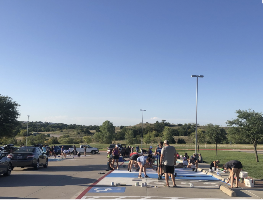 Aug. 28, students and their parents worked on painting their personal parking spots to kick off senior year.