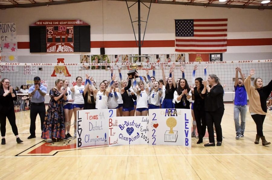 The+Lady+Eagles+celebrate+after+winning+the+2022+Bi-District+Championship.