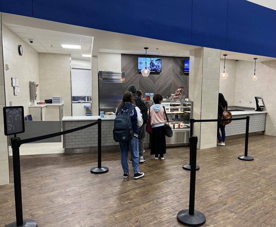 Students wait in line at the Eagle Cafe to pick from their assortment of pastries, coffees and drinks. The Cafe is back this semester following a break during the first semester.